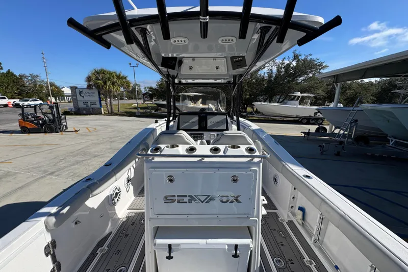  Yacht Photos Pics 2022 Sea Fox 288 Commander boat interior with modern console and rod holders.