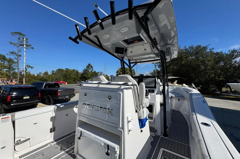  Yacht Photos Pics 2022 Sea Fox 288 Commander boat with sleek design and modern features, parked outdoors.