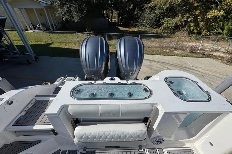  Yacht Photos Pics 2022 Sea Fox 288 Commander boat with dual engines and seating area.