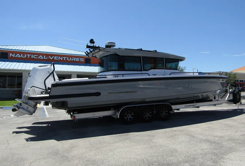 Empoleon Yacht Photos Pics 2025 Axopar 37XC CROSS CABIN BRABUS Trim boat on trailer at Nautical Ventures.