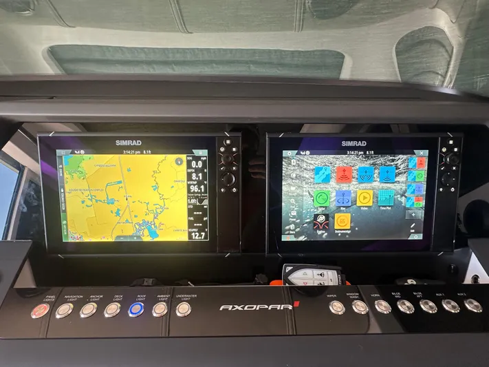 Empoleon Yacht Photos Pics Simrad navigation displays on 2025 Axopar 37XC CROSS CABIN BRABUS Trim dashboard.