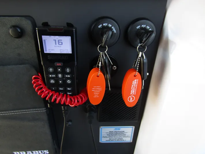 Empoleon Yacht Photos Pics Control panel of 2025 Axopar 37XC CROSS CABIN BRABUS Trim with keys and Simrad device.