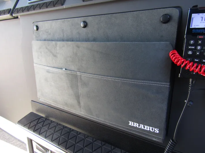 Empoleon Yacht Photos Pics Interior detail of 2025 Axopar 37XC CROSS CABIN BRABUS Trim with communication device.