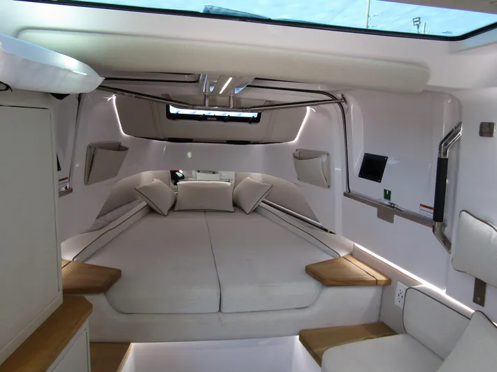 Empoleon Yacht Photos Pics Luxurious interior of 2025 Axopar 37XC CROSS CABIN BRABUS Trim with modern design and comfortable seating.