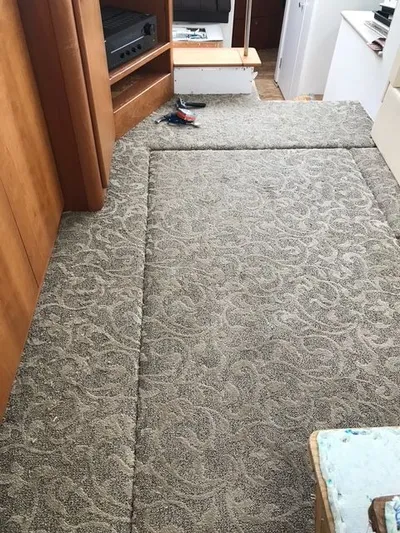 Bottoms Up Yacht Photos Pics Interior of a 1996 Silverton 442 Cockpit Motor Yacht with carpet flooring.