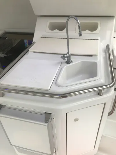 Bottoms Up Yacht Photos Pics Galley area of 1996 Silverton 442 Cockpit Motor Yacht.