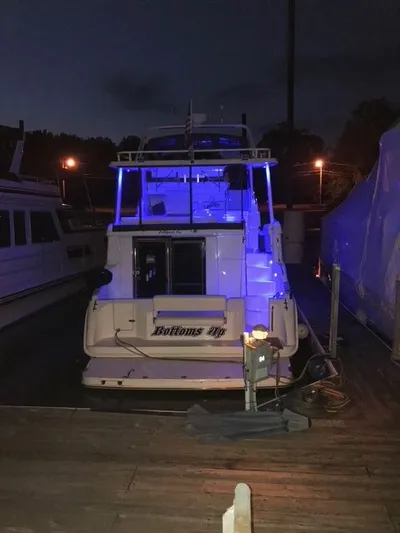 Bottoms Up Yacht Photos Pics 1996 Silverton 442 Cockpit Motor Yacht with night lighting.