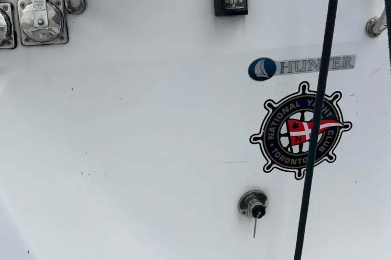 Tru Blu Yacht Photos Pics Sailboat with Hunter logo and National Yacht Club Toronto emblem, 2010 model.