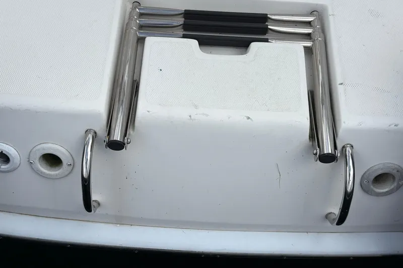 Tru Blu Yacht Photos Pics Stainless steel swim ladder on 2010 Hunter 39 boat deck.