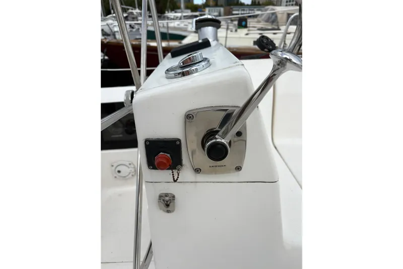 Tru Blu Yacht Photos Pics Control panel of a 2010 Hunter 39 sailboat with throttle and buttons.