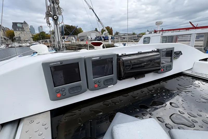 Tru Blu Yacht Photos Pics Hunter 39 sailboat cockpit with navigation instruments, docked in a marina, 2010 model.