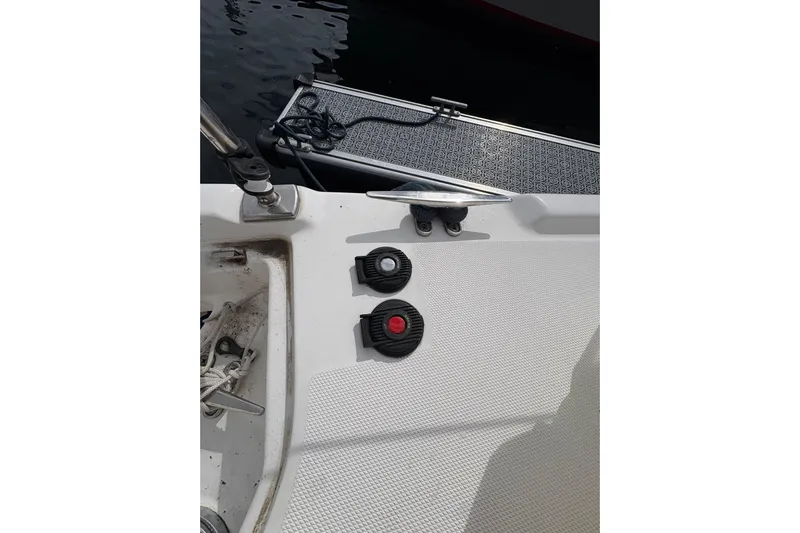 Tru Blu Yacht Photos Pics Deck of 2010 Hunter 39 sailboat with cleat and rope details.