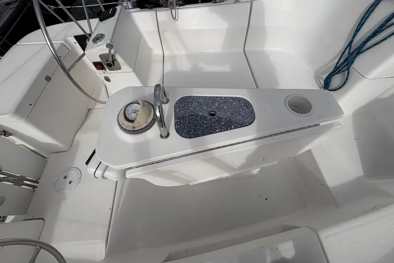 Tru Blu Yacht Photos Pics Cockpit of 2010 Hunter 39 sailboat with steering wheel and navigation instruments.