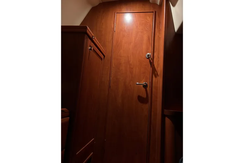 Tru Blu Yacht Photos Pics Wooden interior door inside 2010 Hunter 39 sailboat cabin.