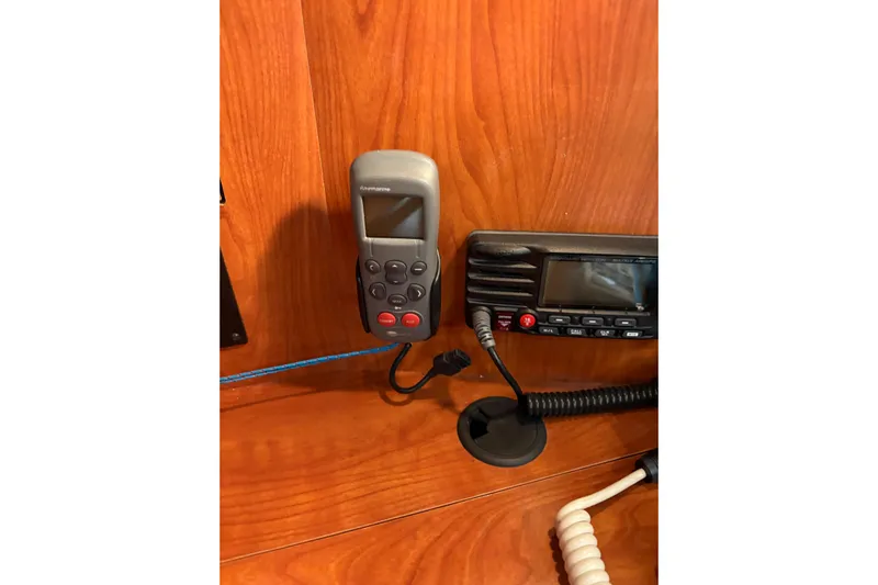 Tru Blu Yacht Photos Pics Boat communication equipment on a 2010 Hunter 39 yacht, featuring a radio and handset.