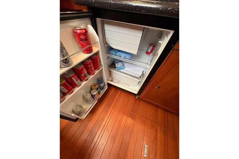 Tru Blu Yacht Photos Pics Small refrigerator stocked with beverages on a 2010 Hunter 39 yacht.