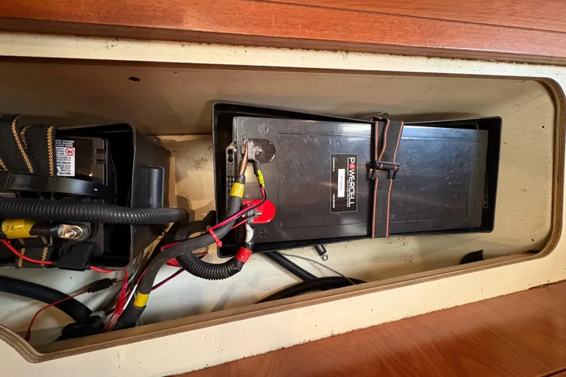 Tru Blu Yacht Photos Pics Battery compartment of a 2010 Hunter 39 sailboat with secured wiring and connections.