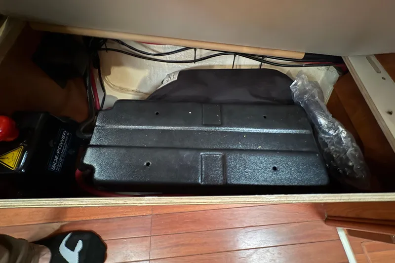 Tru Blu Yacht Photos Pics Battery compartment of a 2010 Hunter 39 boat, featuring Side-Power equipment.