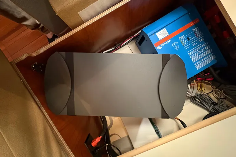 Tru Blu Yacht Photos Pics Electrical components inside a 2010 Hunter 39 yacht, featuring a blue inverter and wiring.