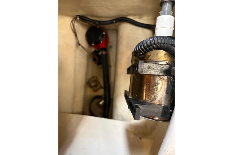 Tru Blu Yacht Photos Pics Bilge pump system inside a 2010 Hunter 39 sailboat.
