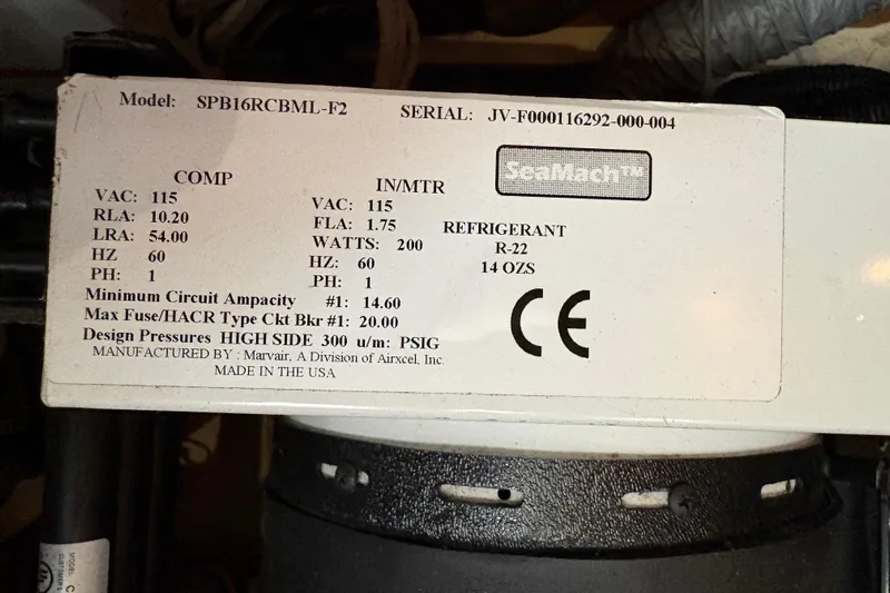 Tru Blu Yacht Photos Pics Label on SeaMach unit detailing specifications and refrigerant type, model SPB16RCBML-F2.