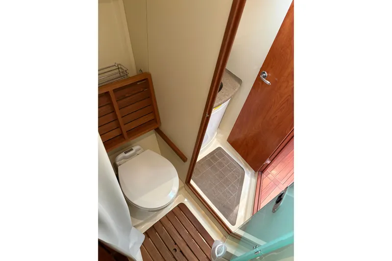 Tru Blu Yacht Photos Pics 2010 Hunter 39 yacht bathroom with wooden accents and compact design.