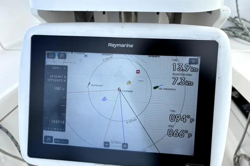 Tru Blu Yacht Photos Pics Raymarine navigation display on 2010 Hunter 39 sailboat showing speed and coordinates.