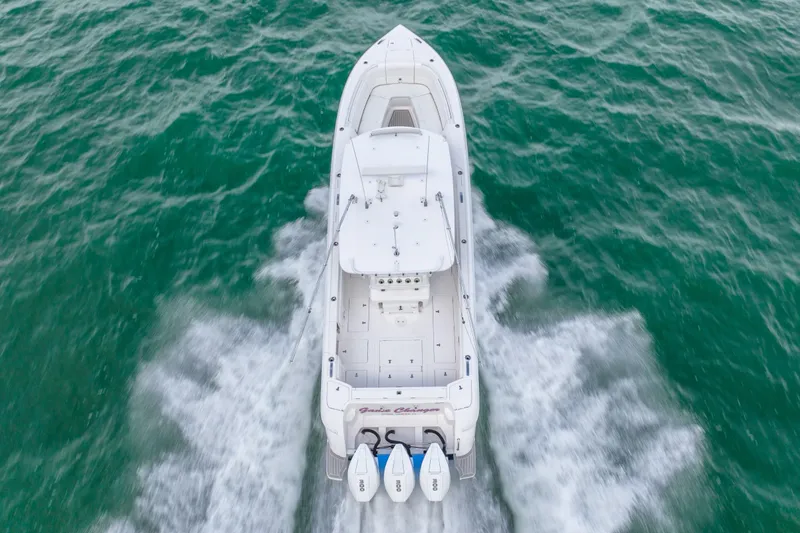 Yacht Photos Pics Aerial view of a 2022 Intrepid 375 Nomad FE boat cruising on the water.