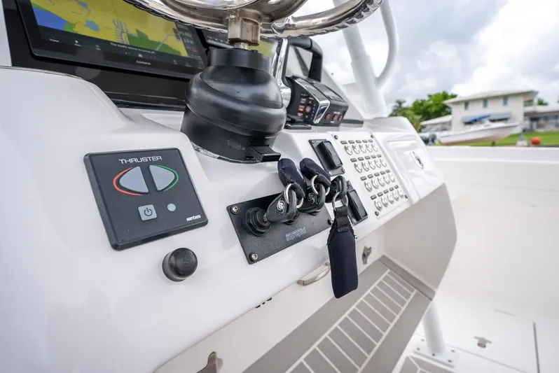  Yacht Photos Pics Control panel of a 2022 Intrepid 375 Nomad FE boat with navigation system.