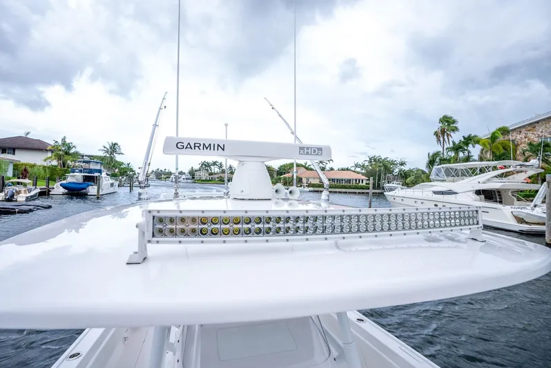  Yacht Photos Pics 2022 Intrepid 375 Nomad FE boat with Garmin radar on a marina.