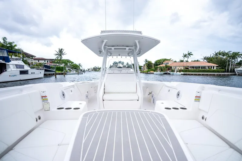  Yacht Photos Pics 2022 Intrepid 375 Nomad FE boat interior with waterfront view.