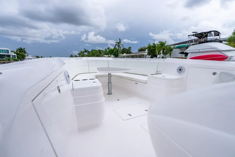  Yacht Photos Pics 2022 Intrepid 375 Nomad FE boat with spacious seating and modern design.