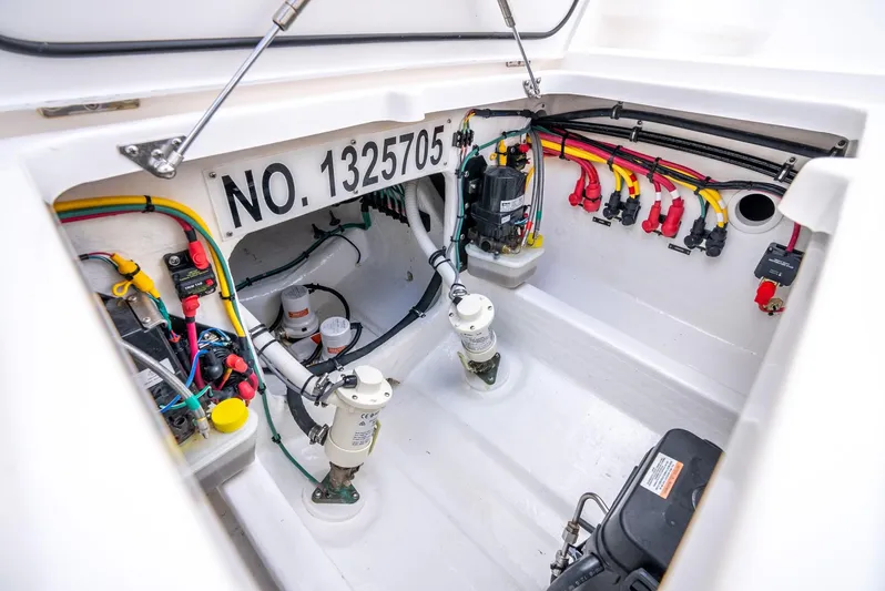  Yacht Photos Pics 2022 Intrepid 375 Nomad FE engine compartment with wiring and components.