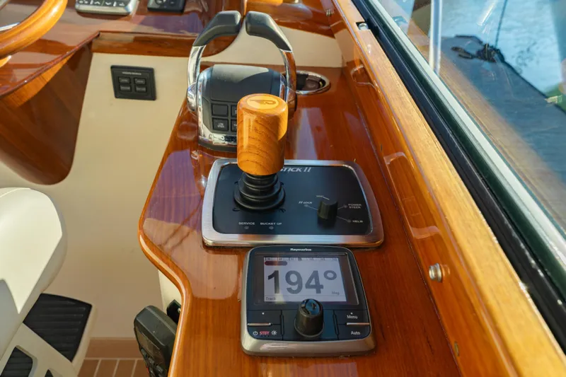 Timeless (name Reserved) Yacht Photos Pics Hinckley Picnic Boat MK III 2015 helm with joystick control and navigation display.