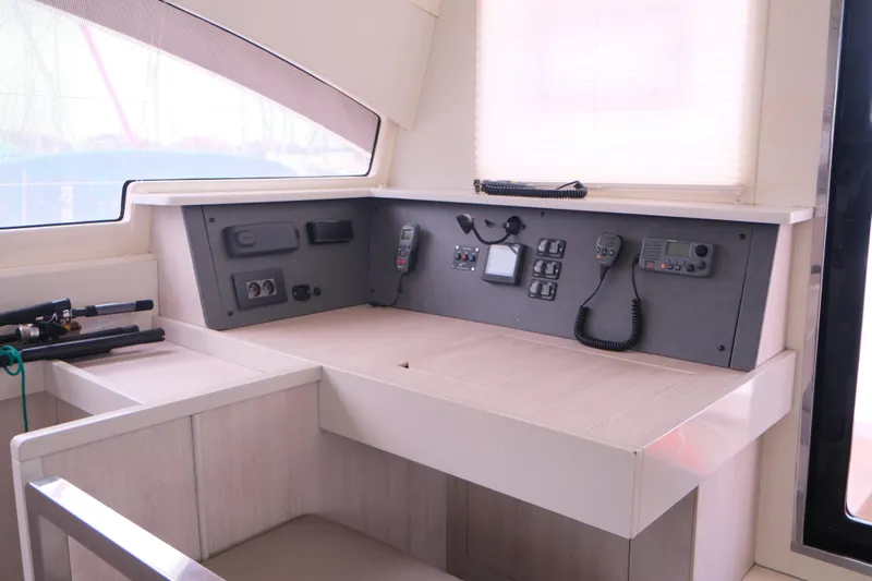 Jolly Dacha Yacht Photos Pics Leopard 48 yacht helm station, featuring navigation controls and communication equipment, 2015 model.