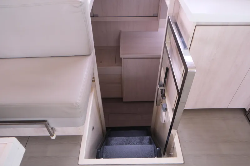 Jolly Dacha Yacht Photos Pics Interior of 2015 Leopard 48 yacht showing stairs to lower deck.