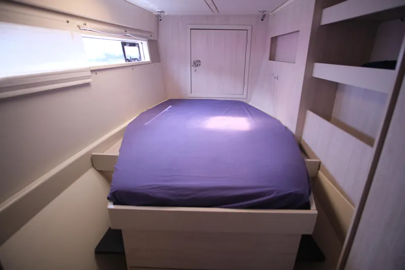 Jolly Dacha Yacht Photos Pics Leopard 48 yacht interior bedroom with purple bedding, 2015 model.