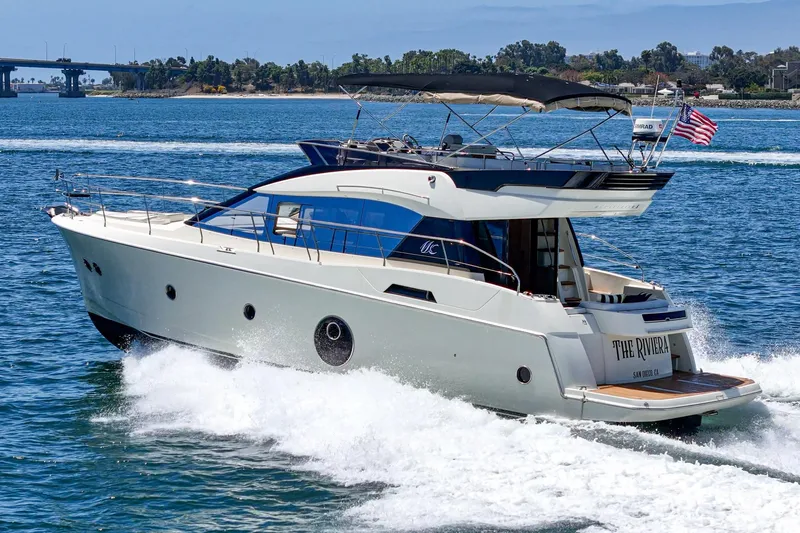 The Riviera Yacht Photos Pics 2017 Monte Carlo MC5S yacht cruising on open water, displaying sleek design and luxury.