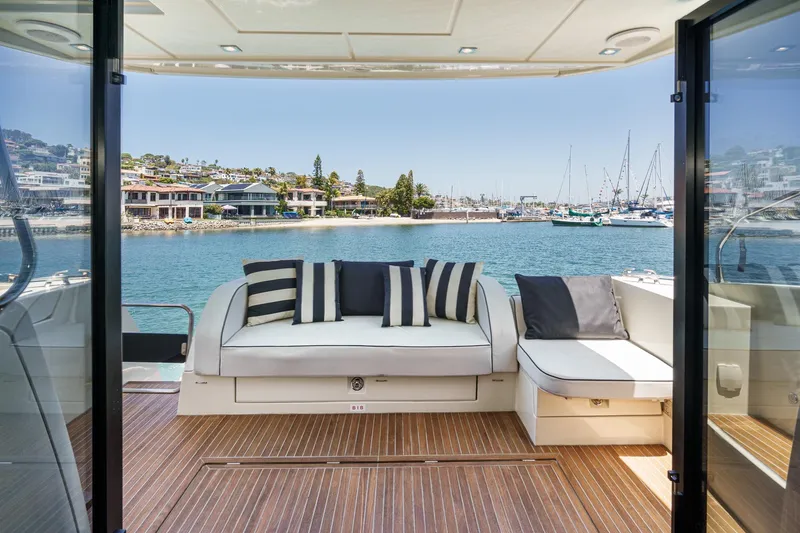 The Riviera Yacht Photos Pics Luxury Monte Carlo MC5S 2017 yacht interior with waterfront view and elegant seating.