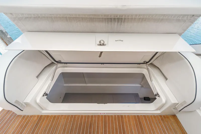 The Riviera Yacht Photos Pics Open storage compartment on 2017 Monte Carlo MC5S yacht, featuring sleek design and ample space.