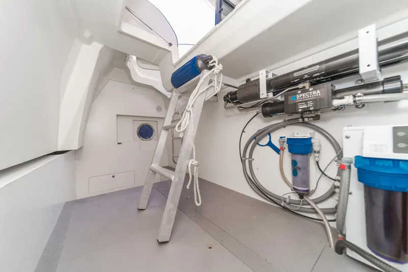 The Riviera Yacht Photos Pics Interior of 2017 Monte Carlo MC5S yacht showing equipment and ladder.