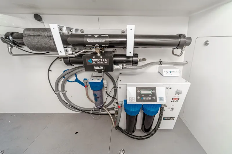 The Riviera Yacht Photos Pics Spectra watermaker system in 2017 Monte Carlo MC5S yacht, featuring advanced filtration technology.