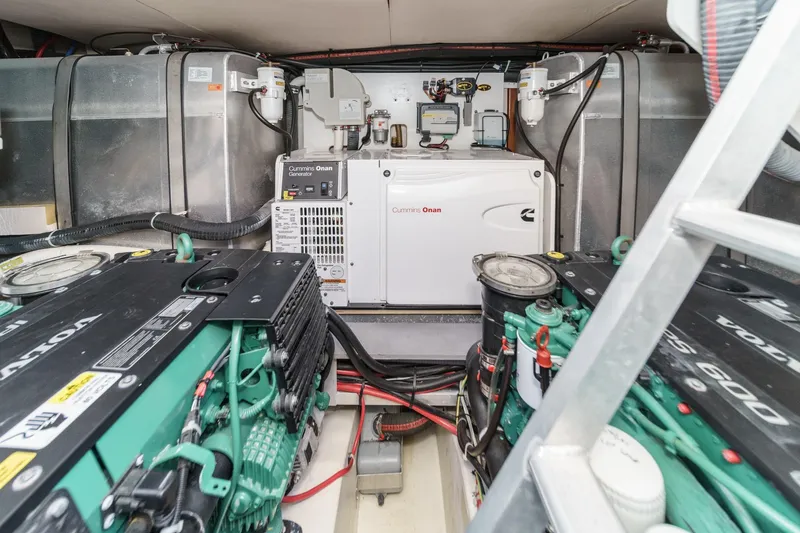 The Riviera Yacht Photos Pics Engine room of 2017 Monte Carlo MC5S with Cummins Onan generator and Volvo engines.