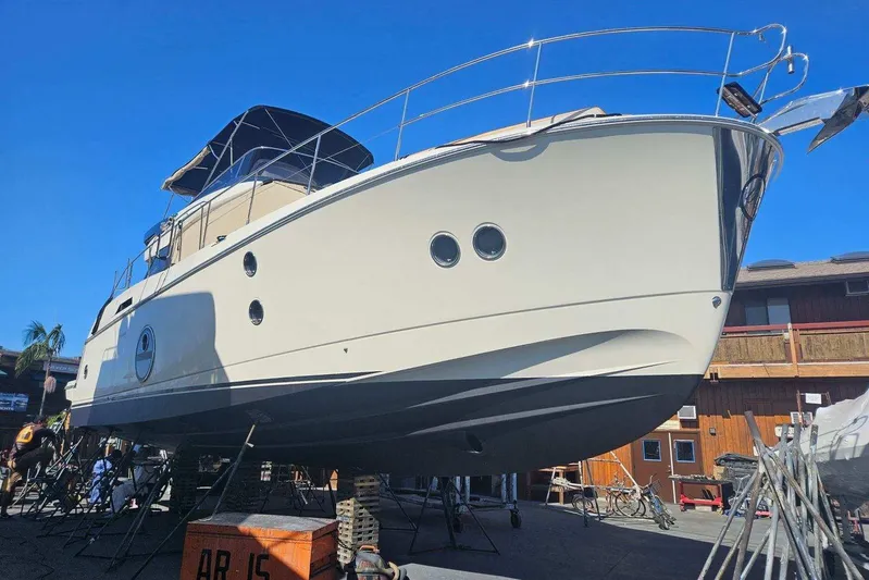 The Riviera Yacht Photos Pics 2017 Monte Carlo MC5S yacht on dry dock, showcasing sleek design and modern features.