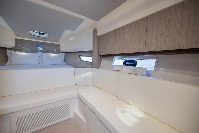  Yacht Photos Pics Luxurious interior of 2024 Sessa Marine C36 OB yacht cabin with modern furnishings.