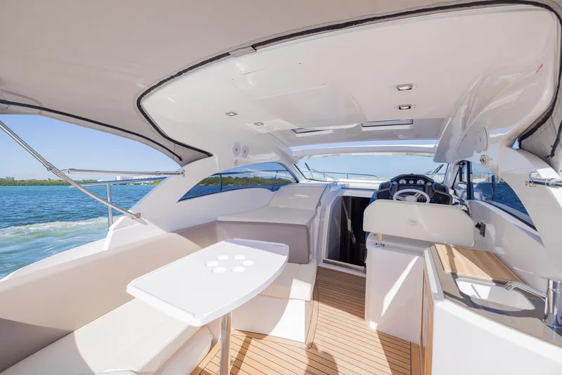  Yacht Photos Pics Luxurious 2024 Sessa Marine C36 OB yacht interior with sleek design and spacious seating.