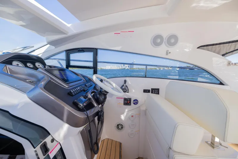  Yacht Photos Pics 2024 Sessa Marine C36 OB yacht cockpit with modern controls and ocean view.