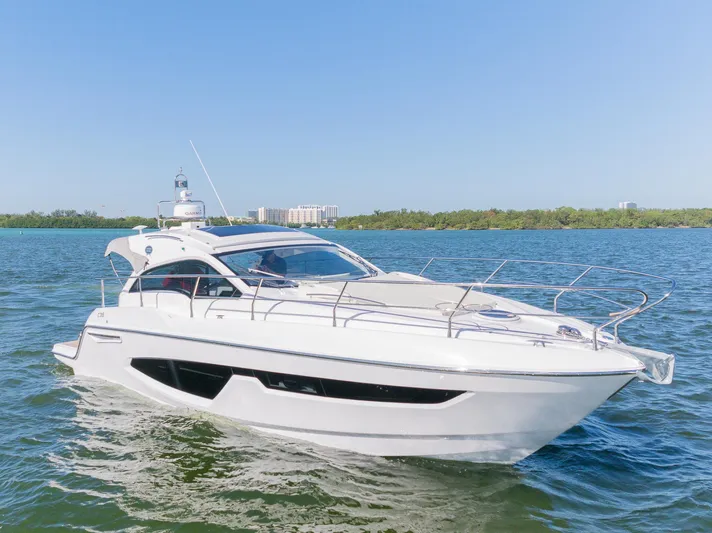  Yacht Photos Pics 2024 Sessa Marine C36 OB yacht cruising on a sunny day.