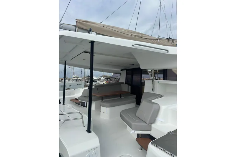  Yacht Photos Pics 2025 Fountaine Pajot 41 catamaran with spacious outdoor seating and modern design.
