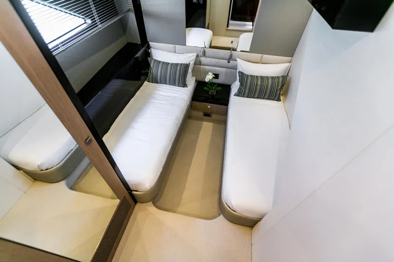 My Serenity Yacht Photos Pics Luxurious twin cabin interior of 2018 Sunseeker Manhattan 66 yacht.